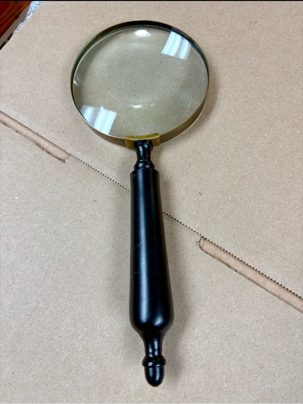 Classic Handheld Magnifying Glass in Black and Brass